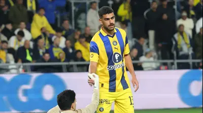 רז שלמה שחקן מכבי תל אביב עם השוער אופק מליקה. אודי ציטיאט