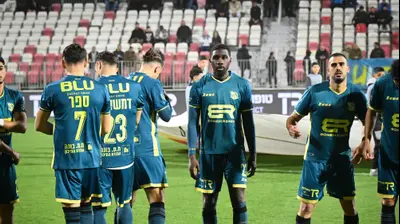 כריסט טייהי ושחקני מכבי בני ריינה. ברני ארדוב