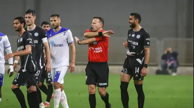 אוראל גרינפלד שופט כדורגל מבטל פנדל. קובי אליהו