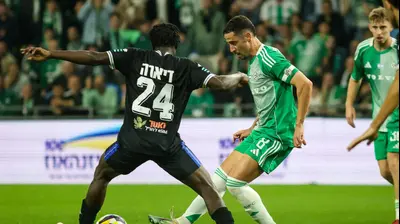 דולב חזיזה שחקן מכבי חיפה. קובי אליהו