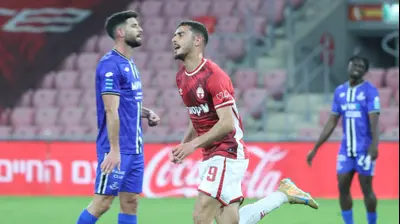 שחקן הפועל באר שבע, זאהי אחמד. דני מרון