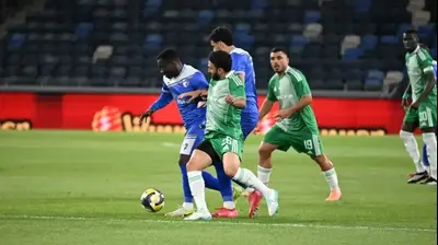 מיכאל אוחנה שחקן מכבי חיפה מול יאו אקה שחקן עירוני קרית שמונה. מכבי חיפה,אתר רשמי