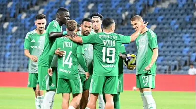 שחקני מכבי חיפה חוגגים. מכבי חיפה,אתר רשמי