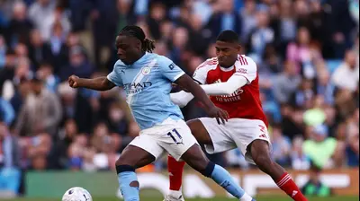 ז'רמי דוקו שחקן מנצ'סטר סיטי לפני כריסטיאן מוסקרה שחקן ארסנל. רויטרס