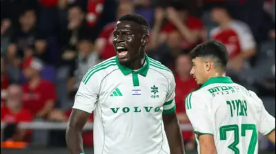 עבדולאי סק שחקן מכבי חיפה. קובי אליהו