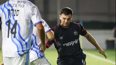 שחקן הפועל באר שבע איתי רוטמן. קובי אליהו